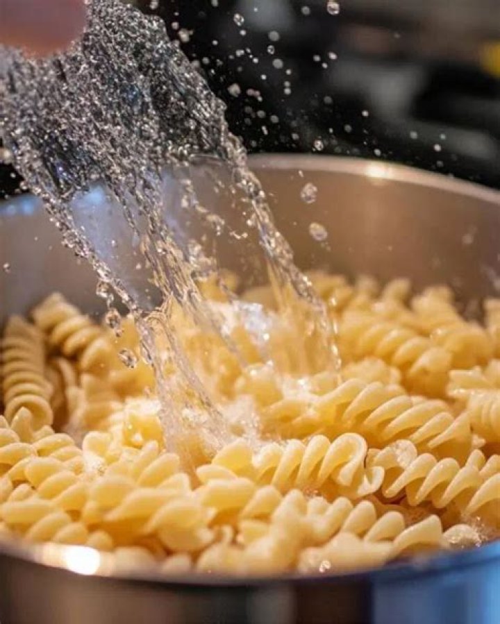 Do you rinse pasta with hot or cold water?