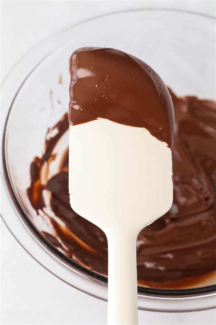 How do you add alcohol to chocolate without seizing it?