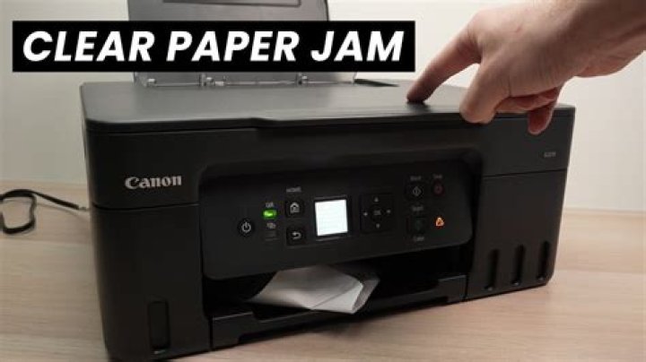 How do you get a jammed paper out of a Lexmark printer?
