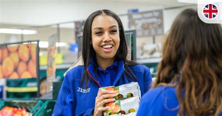 How does Tesco meet their aims?