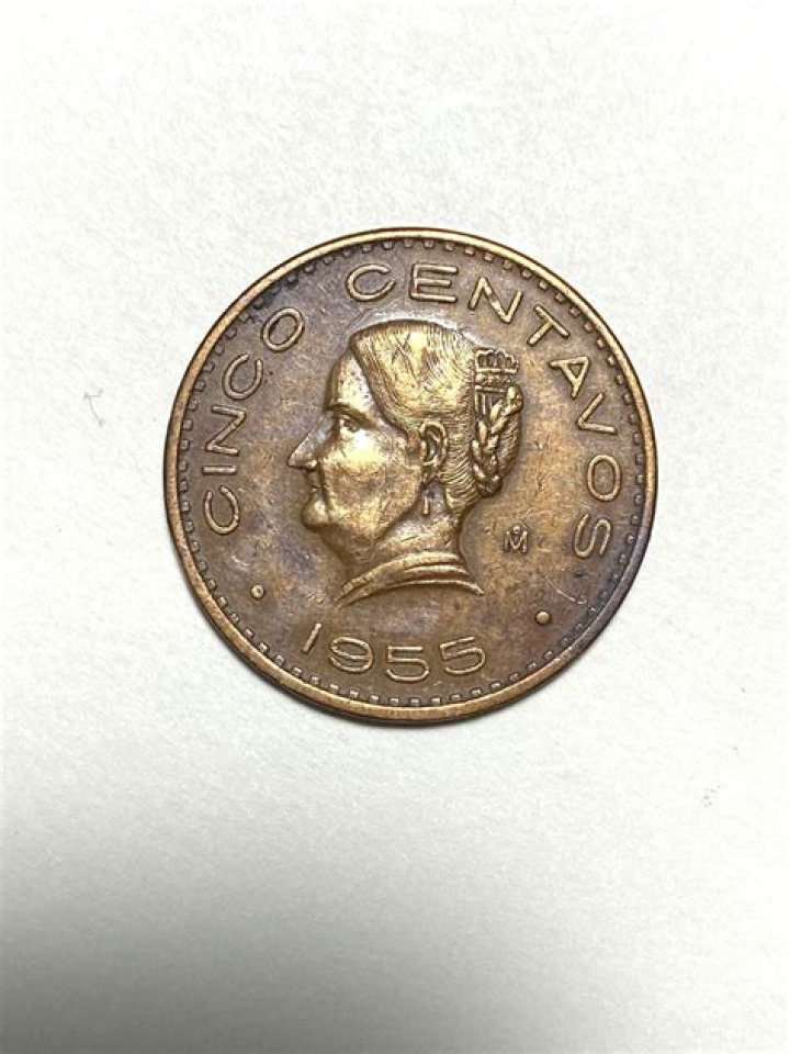 How much is a 1955 cinco centavos coin worth?