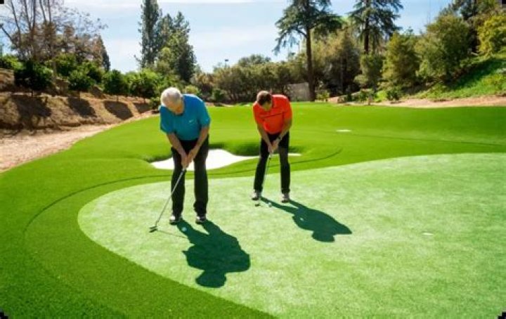 Is it legal to touch the green in golf?