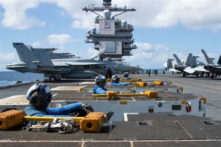 What catches the plane on an aircraft carrier?