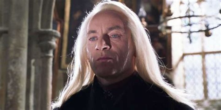 What curse was Lucius using on Harry?