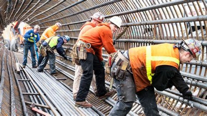 What do ironworkers do in construction?