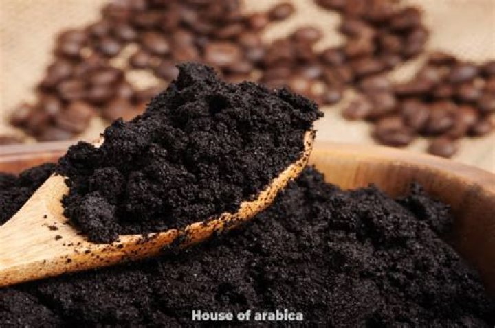 What does coffee grounds stool look like?