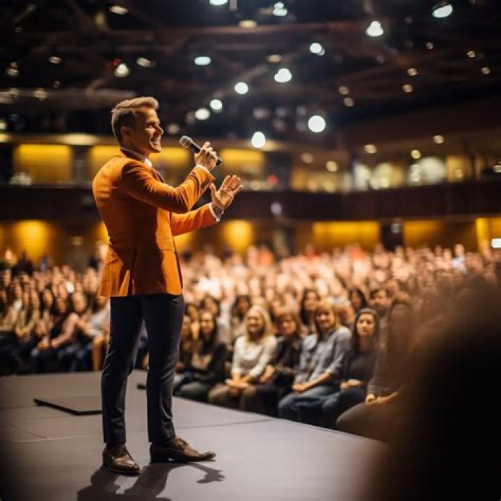What is the role of a motivational speaker?