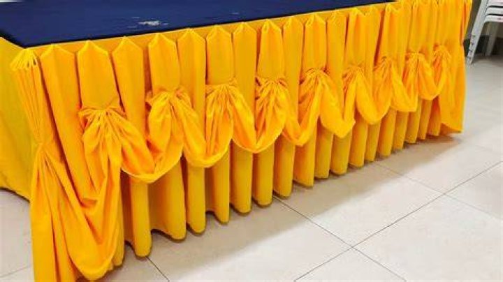 What is the significance of having table skirting during occasions?