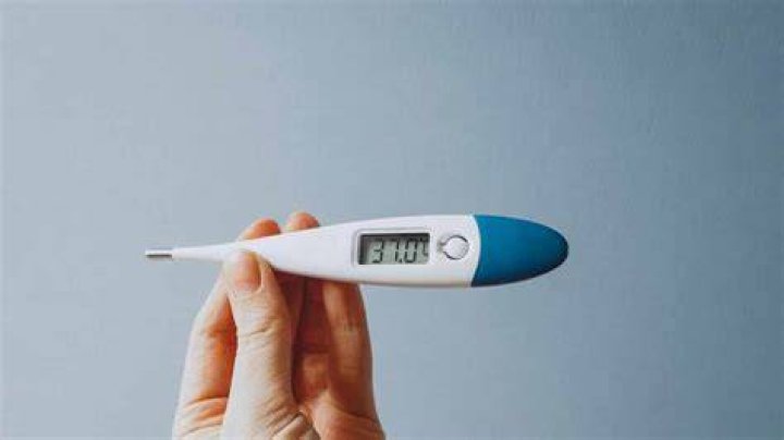 What temperature should I go to the hospital?