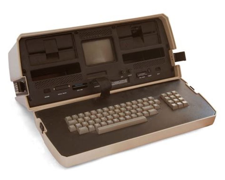 Who launched the first laptop computer in 1983?
