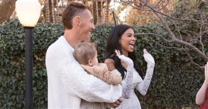 Why does Laila's father stay with his wife?