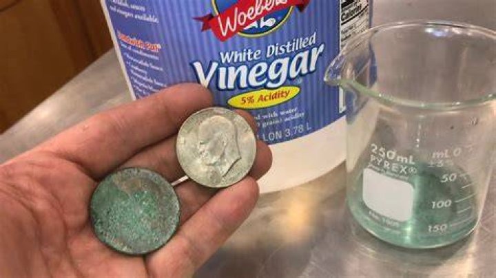 Why does salt and vinegar clean pennies?