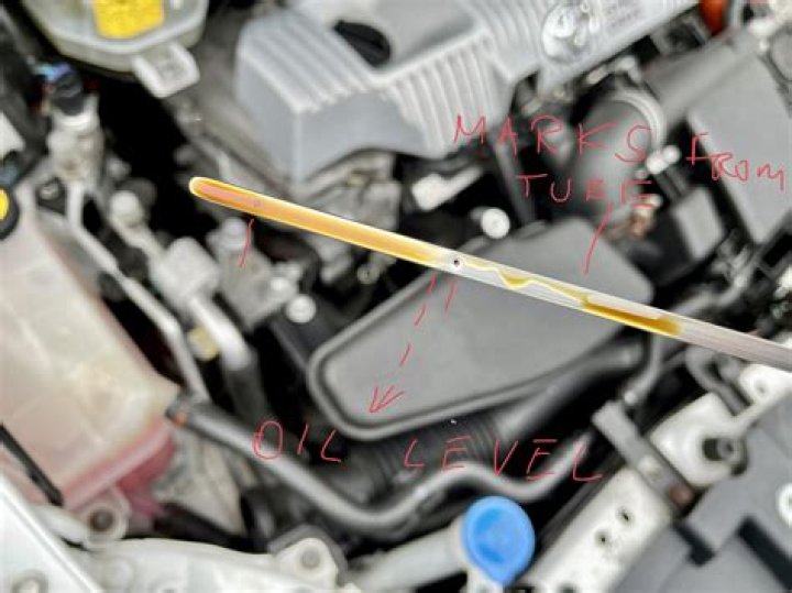 Why is my dipstick dry after oil change?